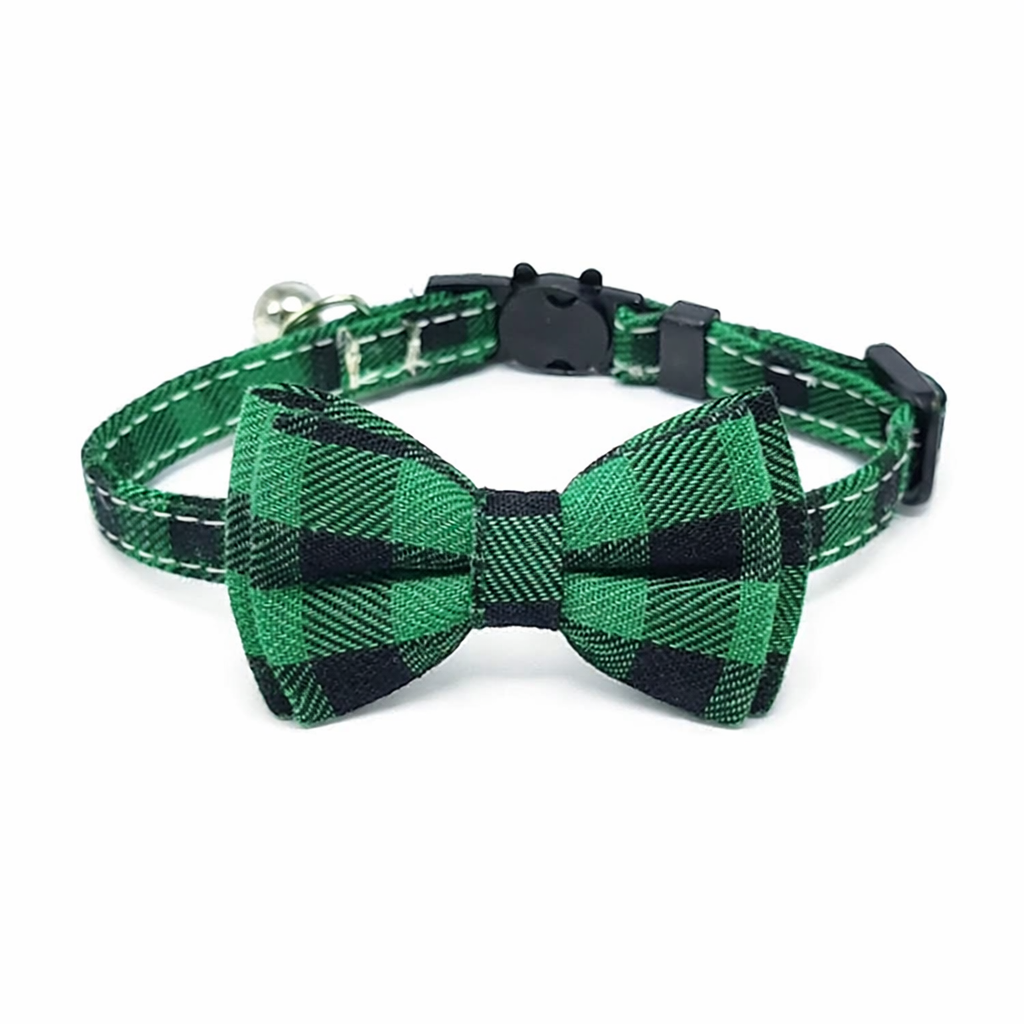 Green plaid cat collar with bow tie, bell and breakaway safety buckle on white background
