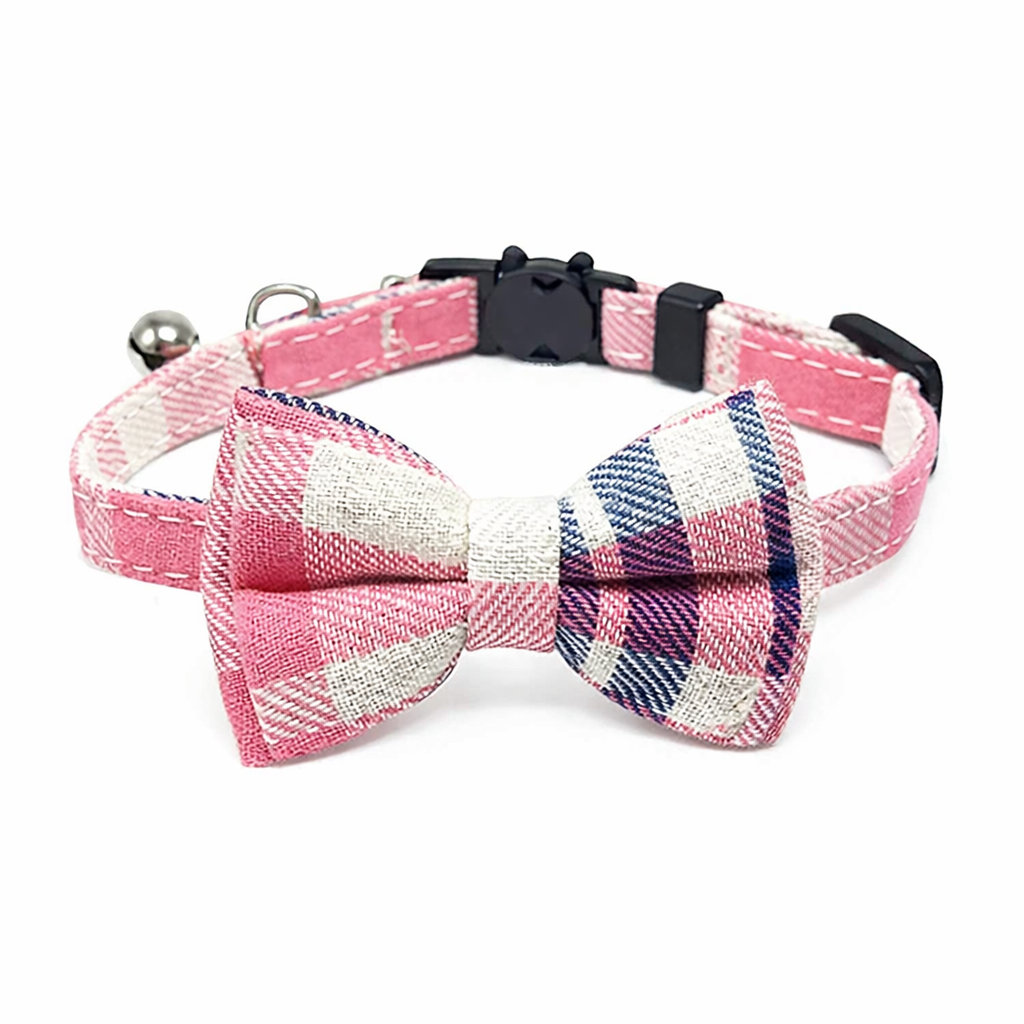 Pink plaid cat collar with bow tie and breakaway safety buckle on white background