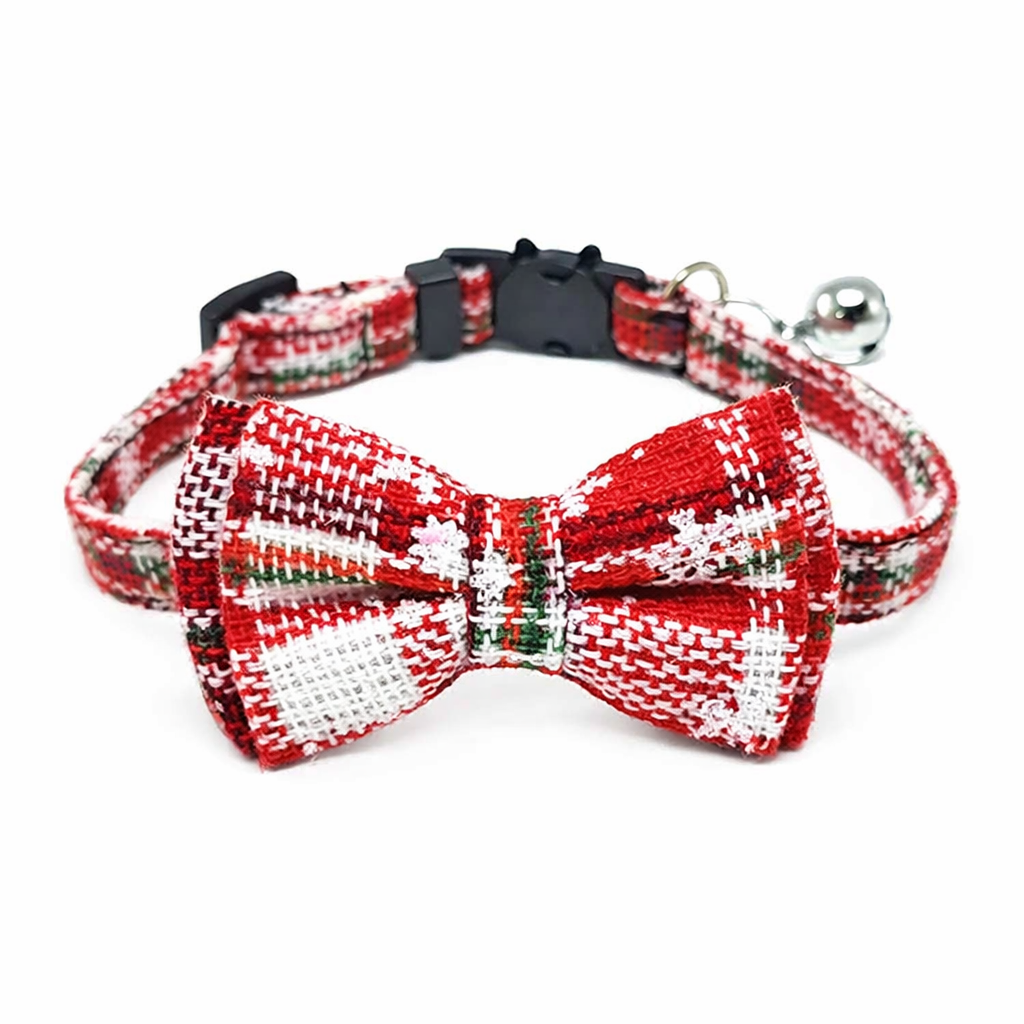 Red and white plaid cat collar with bow tie, bell and breakaway safety buckle on white background